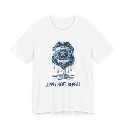 Apply Heat Repeat t-shirt by Moral Fabric — melting ICE badge graphic on progressive activist tee