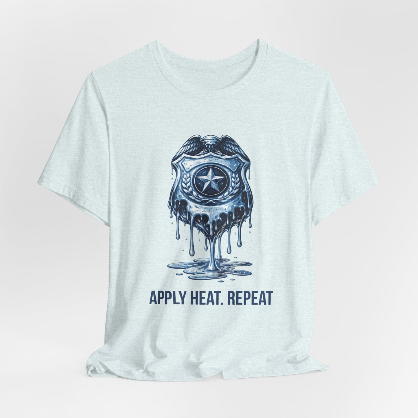 Apply Heat Repeat t-shirt by Moral Fabric — melting ICE badge graphic on progressive activist tee
