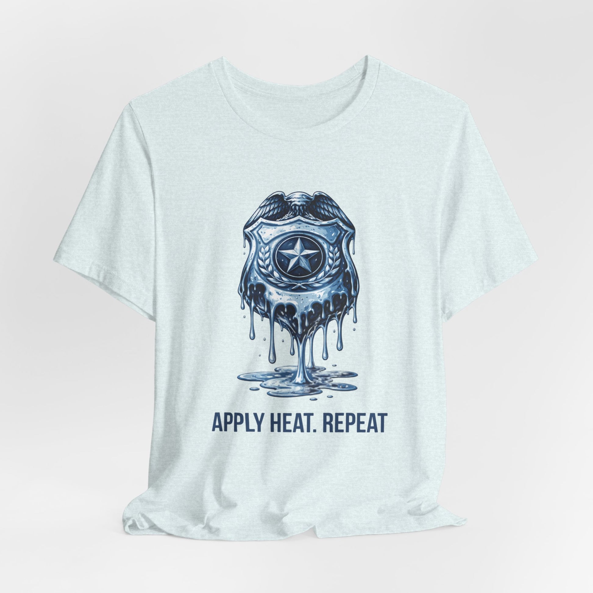 Apply Heat Repeat t-shirt by Moral Fabric — melting ICE badge graphic on progressive activist tee