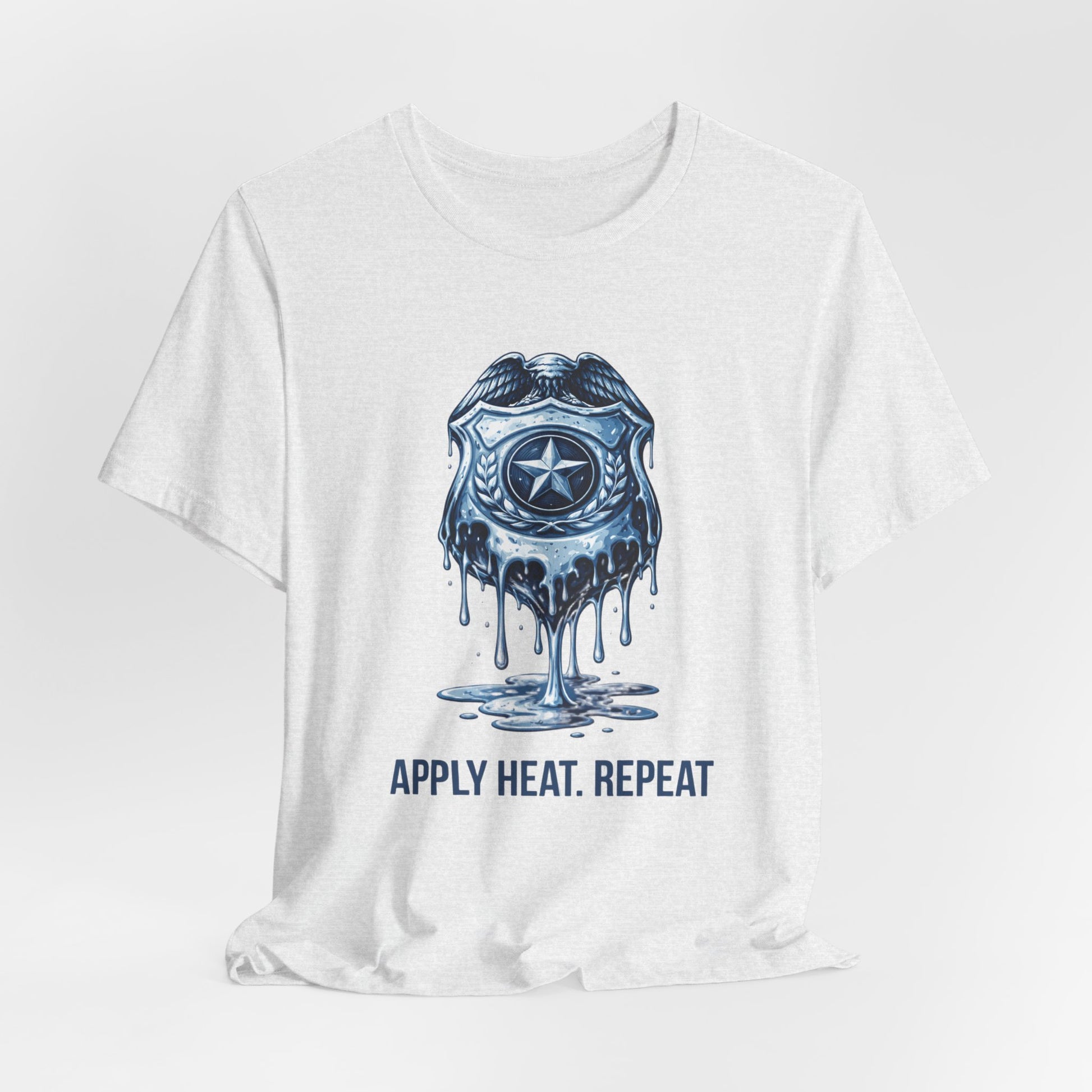 Apply Heat Repeat t-shirt by Moral Fabric — melting ICE badge graphic on progressive activist tee