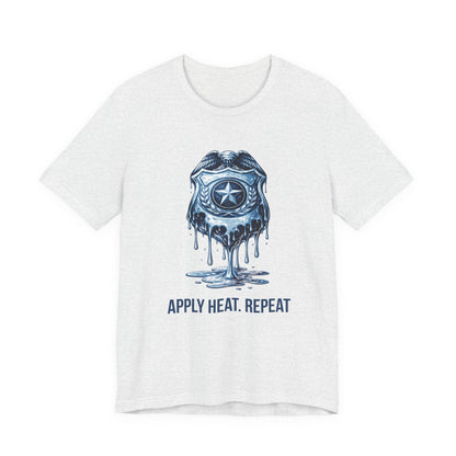 Apply Heat Repeat t-shirt by Moral Fabric — melting ICE badge graphic on progressive activist tee