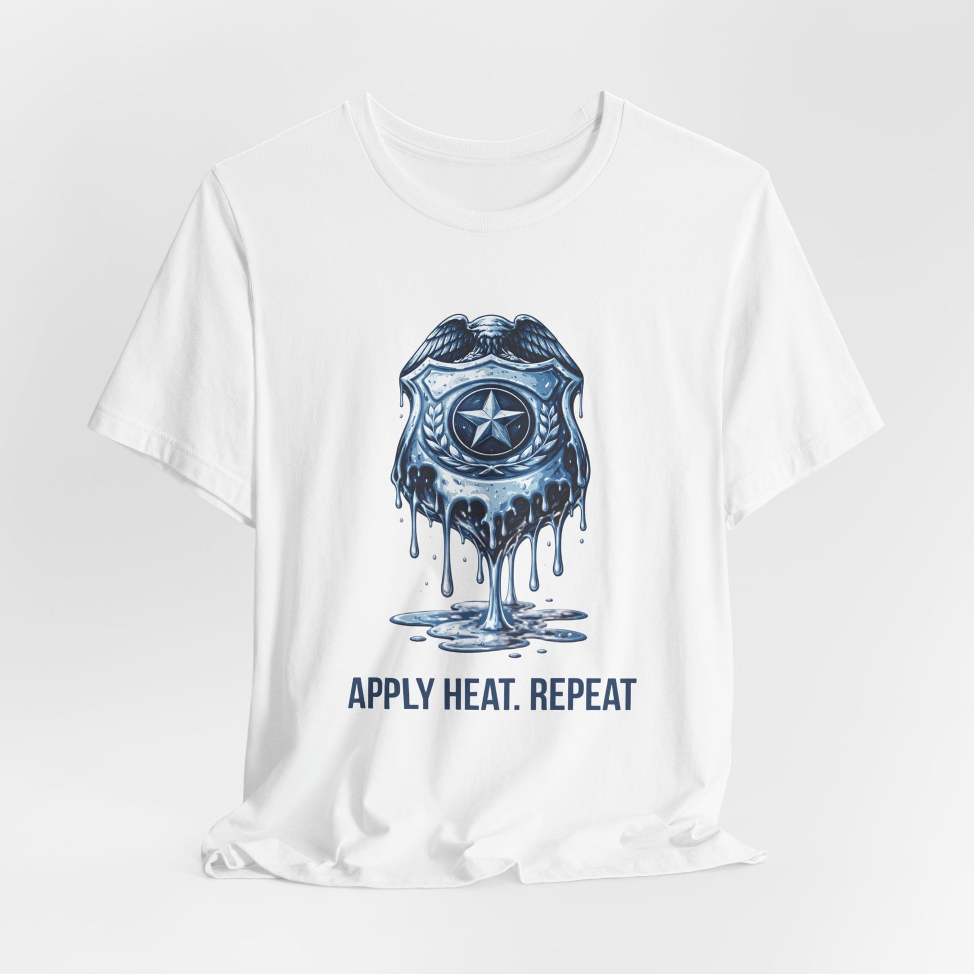Apply Heat Repeat t-shirt by Moral Fabric — melting ICE badge graphic on progressive activist tee
