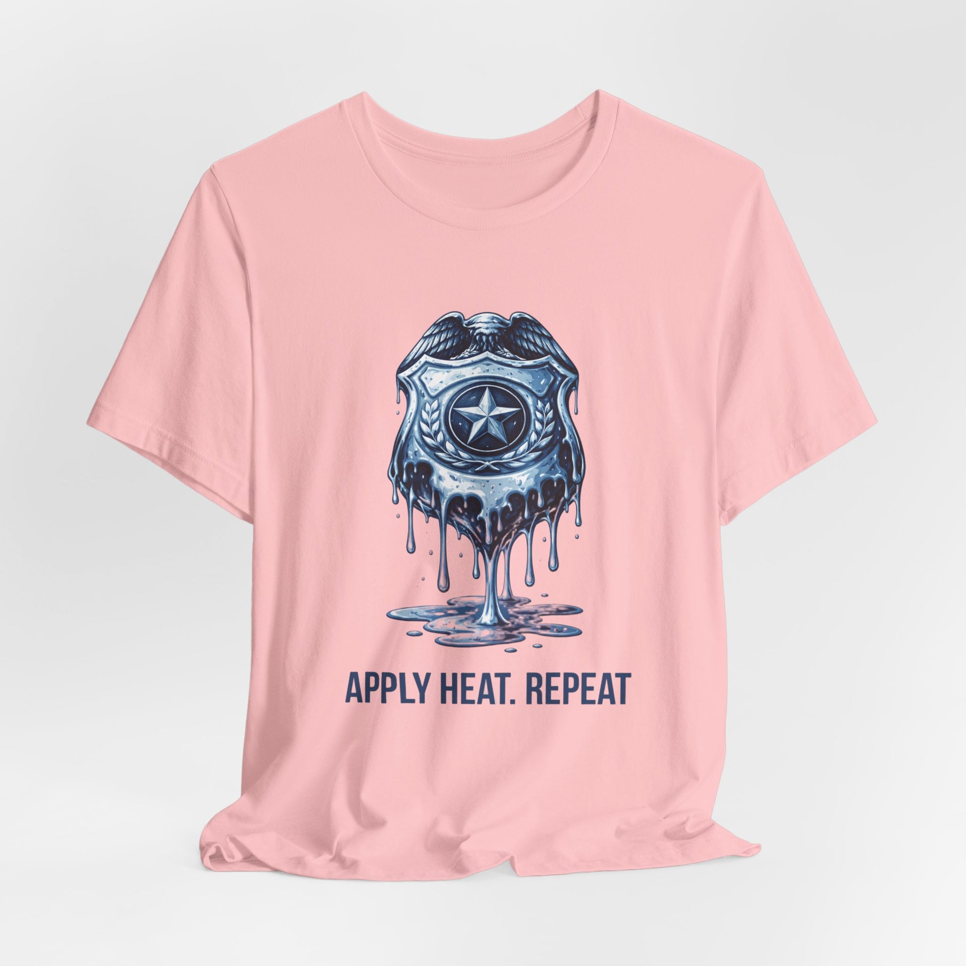 Apply Heat Repeat t-shirt by Moral Fabric — melting ICE badge graphic on progressive activist tee
